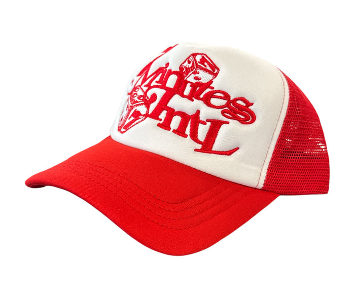 White and red 7 Minutes 'INTL' trucker hat with mesh back and curved brim, casual outdoor headwear.