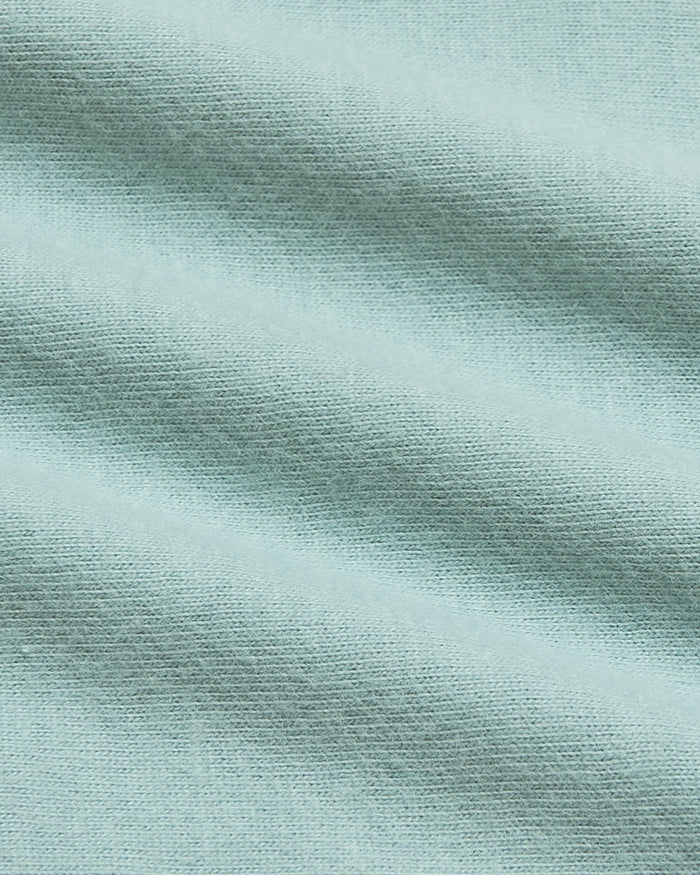 Seabreeze Classic Crew Neck knit fabric close-up showing fine ribbing.