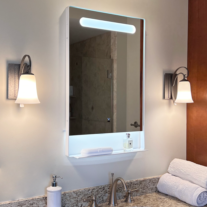 Framed LED bathroom mirror with storage shelf and motion sensor, 22x34