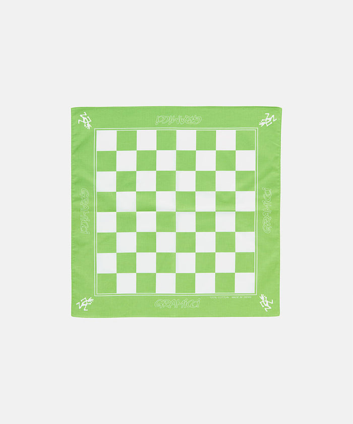 Lime colored Gramicci Checkers Bandana against a light-tone background.