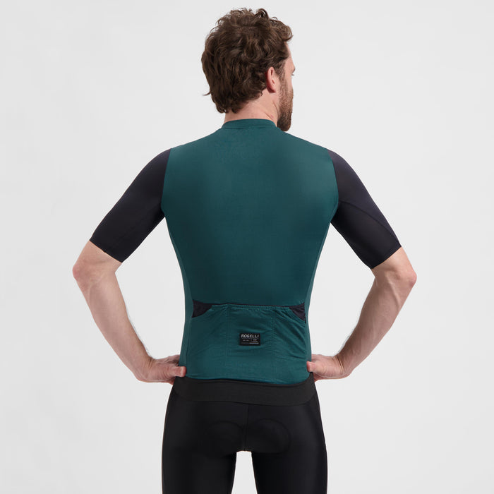 Rogelli Distance II fietsshirt heren teal korte mouw gedragen achterkant.