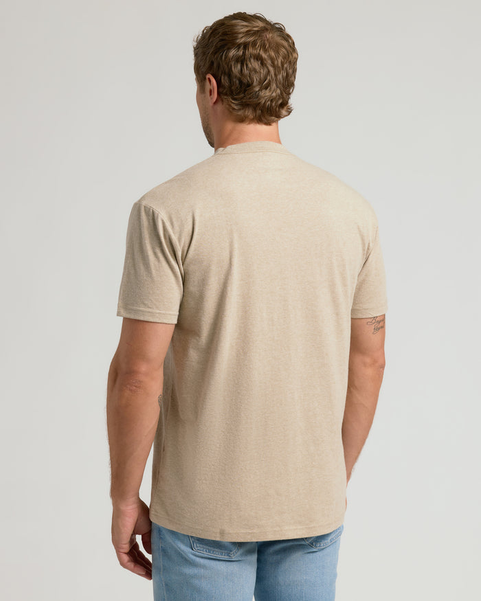 Man wearing Heather Fennel Classic Crew Neck, short-sleeve T-shirt.