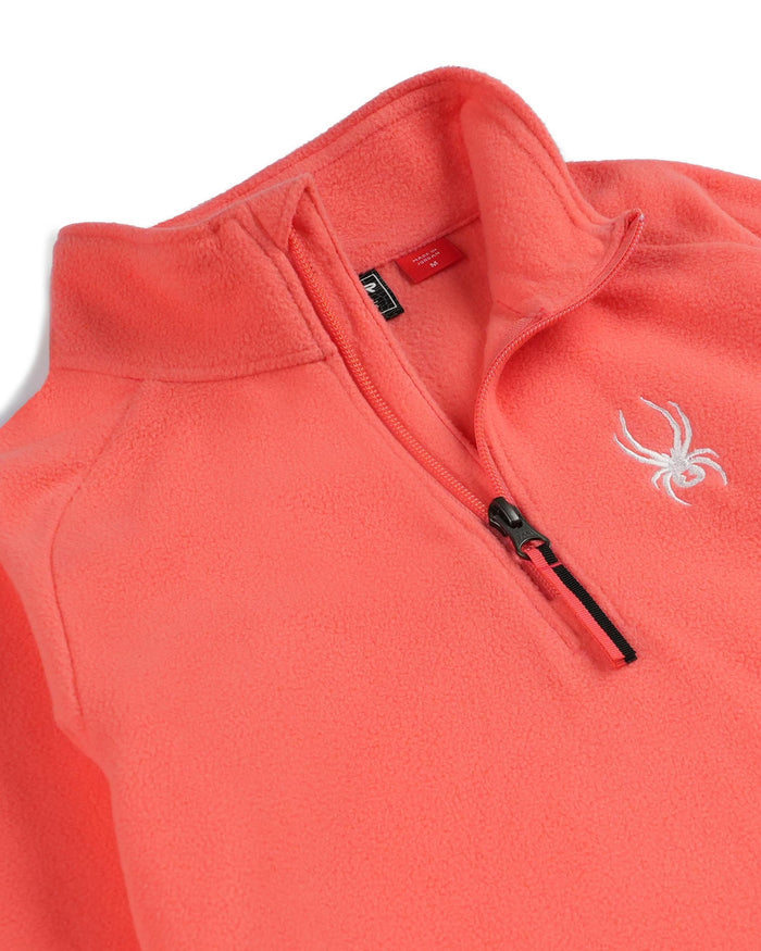 Coral fleece pullover with a brand logo on a white background