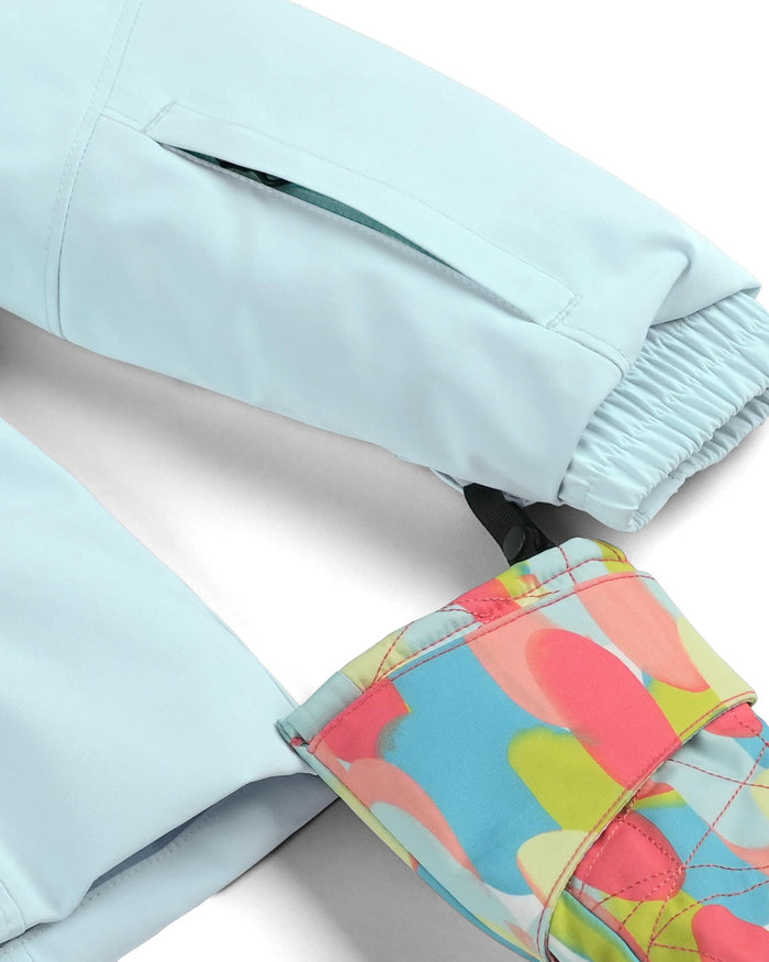 Light blue jacket with colorful floral patterned cuffs on a white background