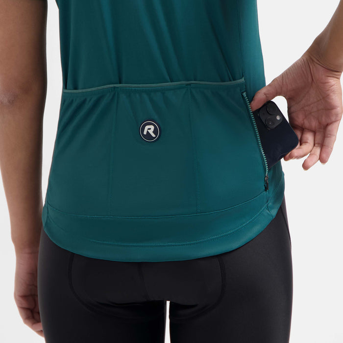 Detail van Rogelli Modesta fietsshirt dames teal korte mouw met achterzakken.