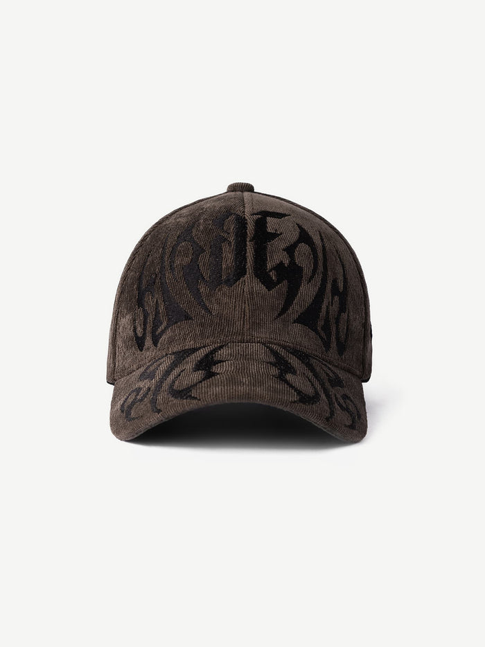 GROOVY RIOT washed brown graphic cap with all-over print and vintage finish