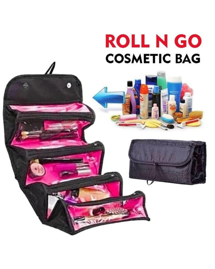 Open black cosmetic organizer pouch with pink lining, multiple zip compartments and pockets
