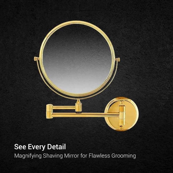 Round 3x magnification shaving mirror with rose gold rim and adjustable pivot arms on dark grey marble - Glazonoid
