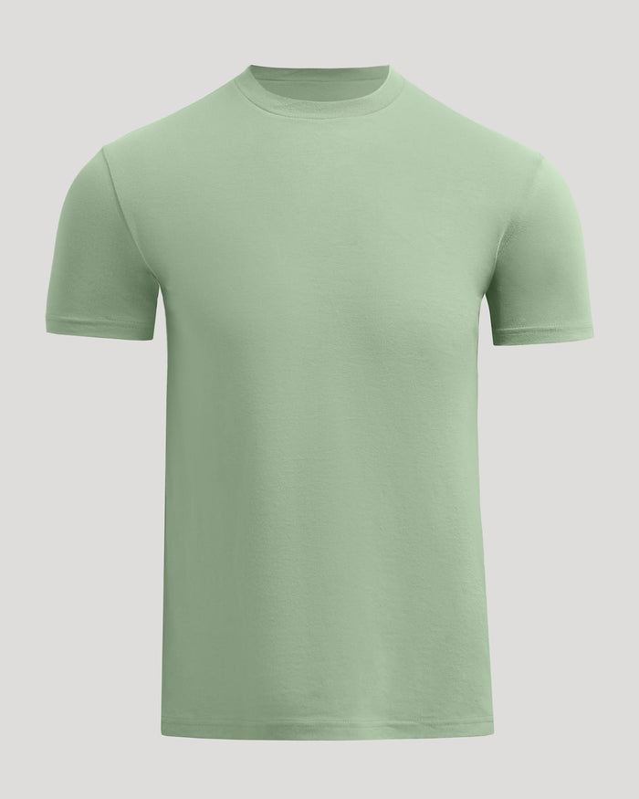 Green t-shirt on a light gray background