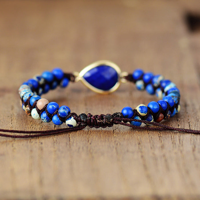 Trendsi blue gemstone teardrop bracelet with vibrant blue beads and adjustable brown cord