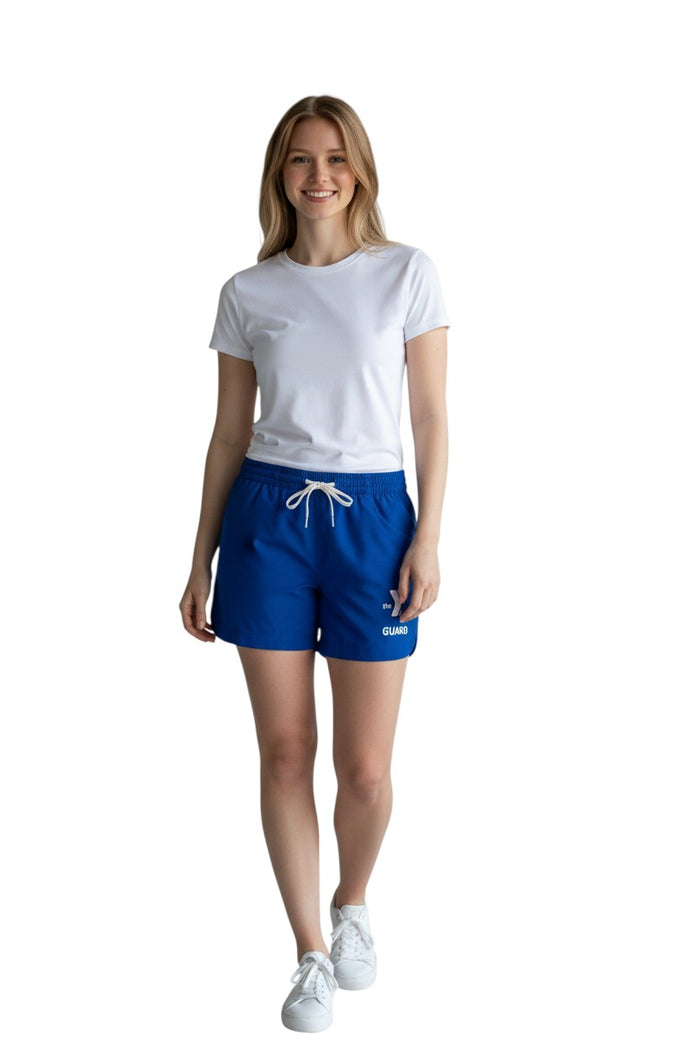 The Lifeguard Store YMCA Roll Short in royal blue polyester with white drawstring and logo. Features quick-dry fabric and UPF 30+ protection.
