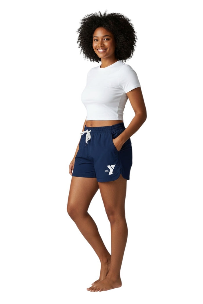 The Lifeguard Store navy blue polyester YMCA roll shorts with white drawstring and pockets. Quick-dry fabric.